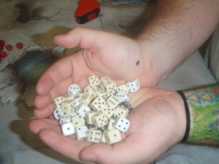 A handful of approximately 50 dice.